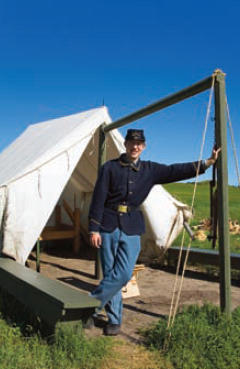 Summer 2009 North Dakota Nice Bismark Historical Reenactor Fort Lincoln State Park A historical reenactor at Fort Lincoln State Park in Mandan, just across the Missouri river from Bismarck.