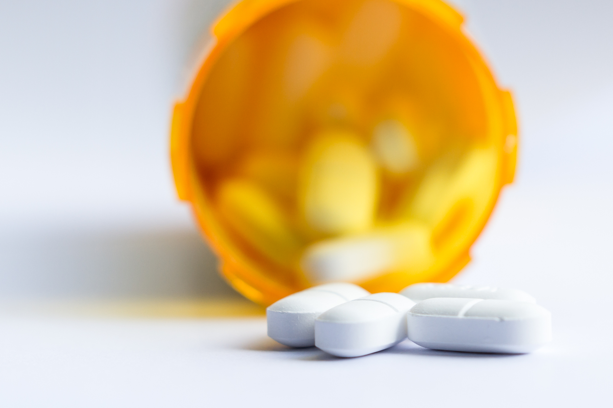 Opioid pain killers in a prescription bottle