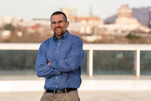 Adam Kaufman, M.D., came to Asheville for the outdoors lifestyle it offered. In his off hours, he enjoys hiking, fishing, running, camping and more. - Photo by Derek DiLuzio