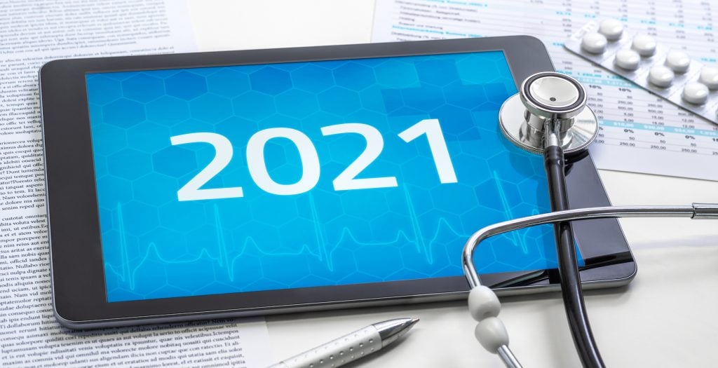 A tablet with the number 2021 on the display