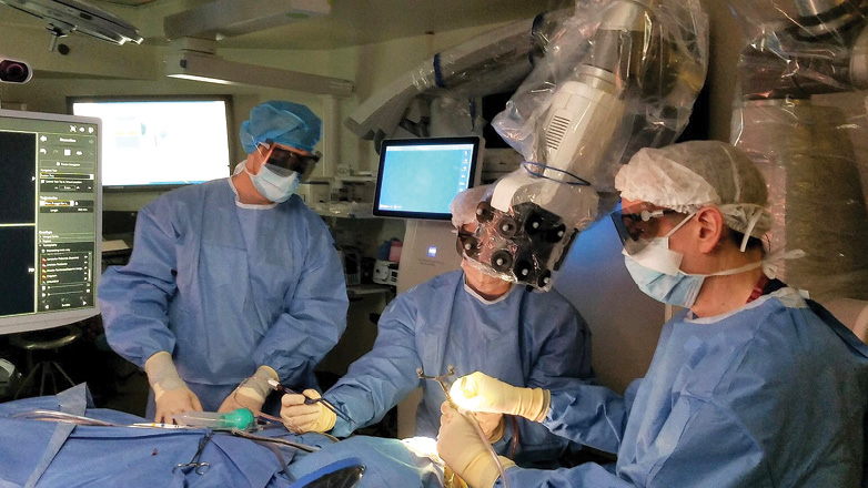 surgeons operating on a patient